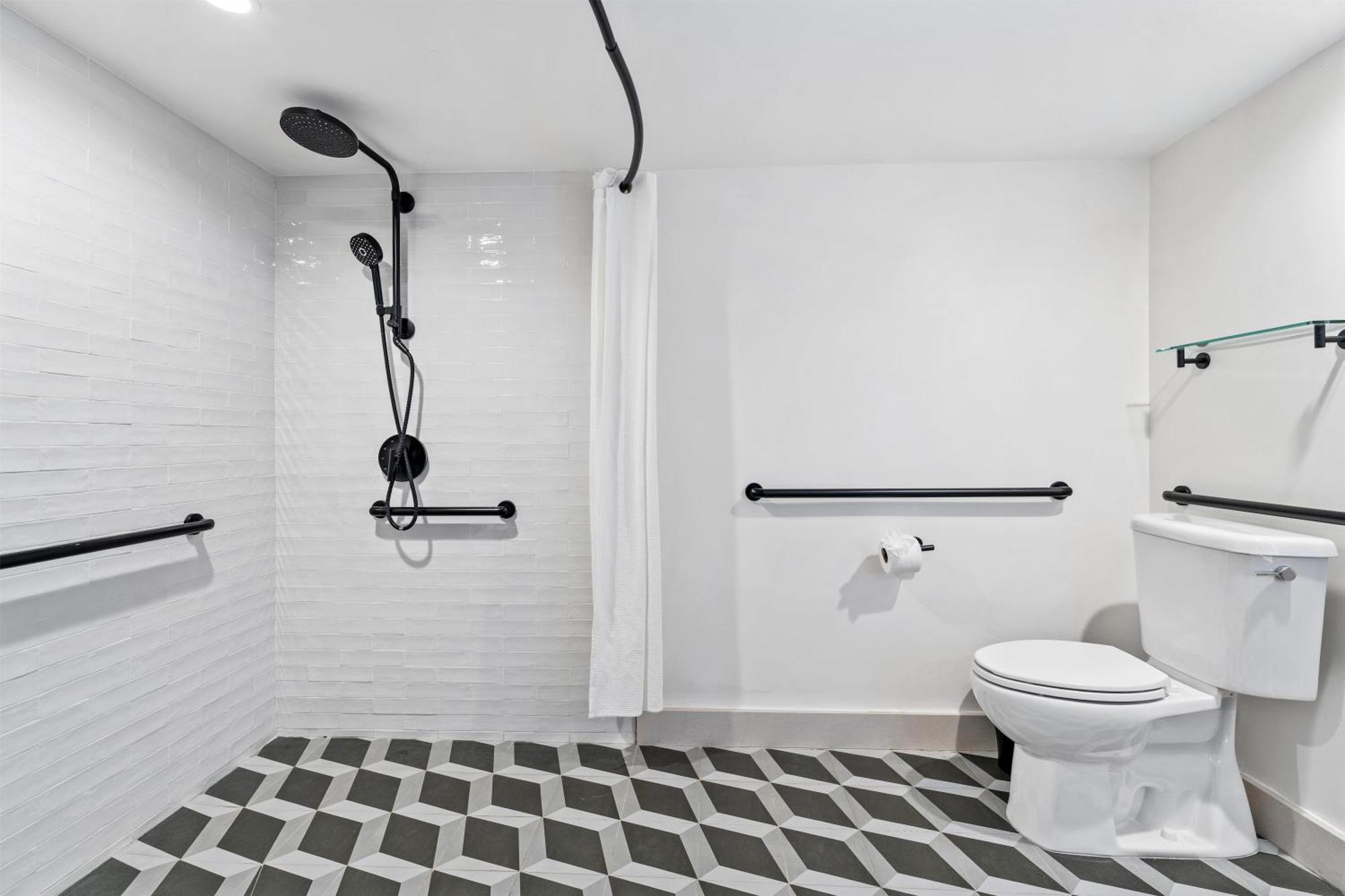 Room One Full Bed Roll Shower Mobility Accessible